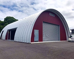 Large arch building with side entrance